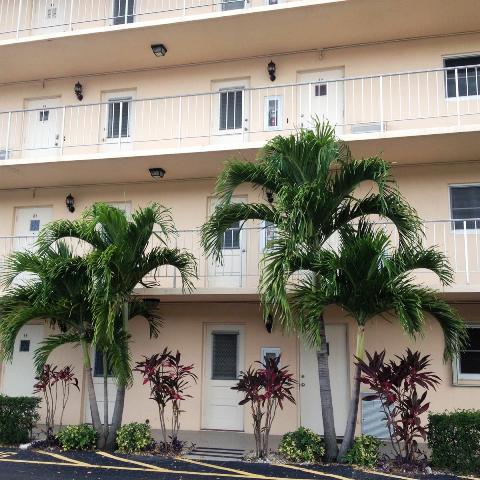 698 Northeast Spanish River Boulevard, Unit 11 Boca Raton, FL 33431 - Photo 1 of 16 Front