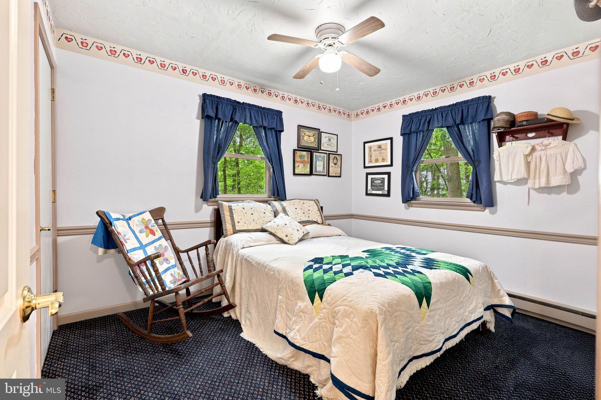 307 Dead End Road Lititz, PA 17543 - Photo 23 of 50 Charming bedroom with rustic decor and views.