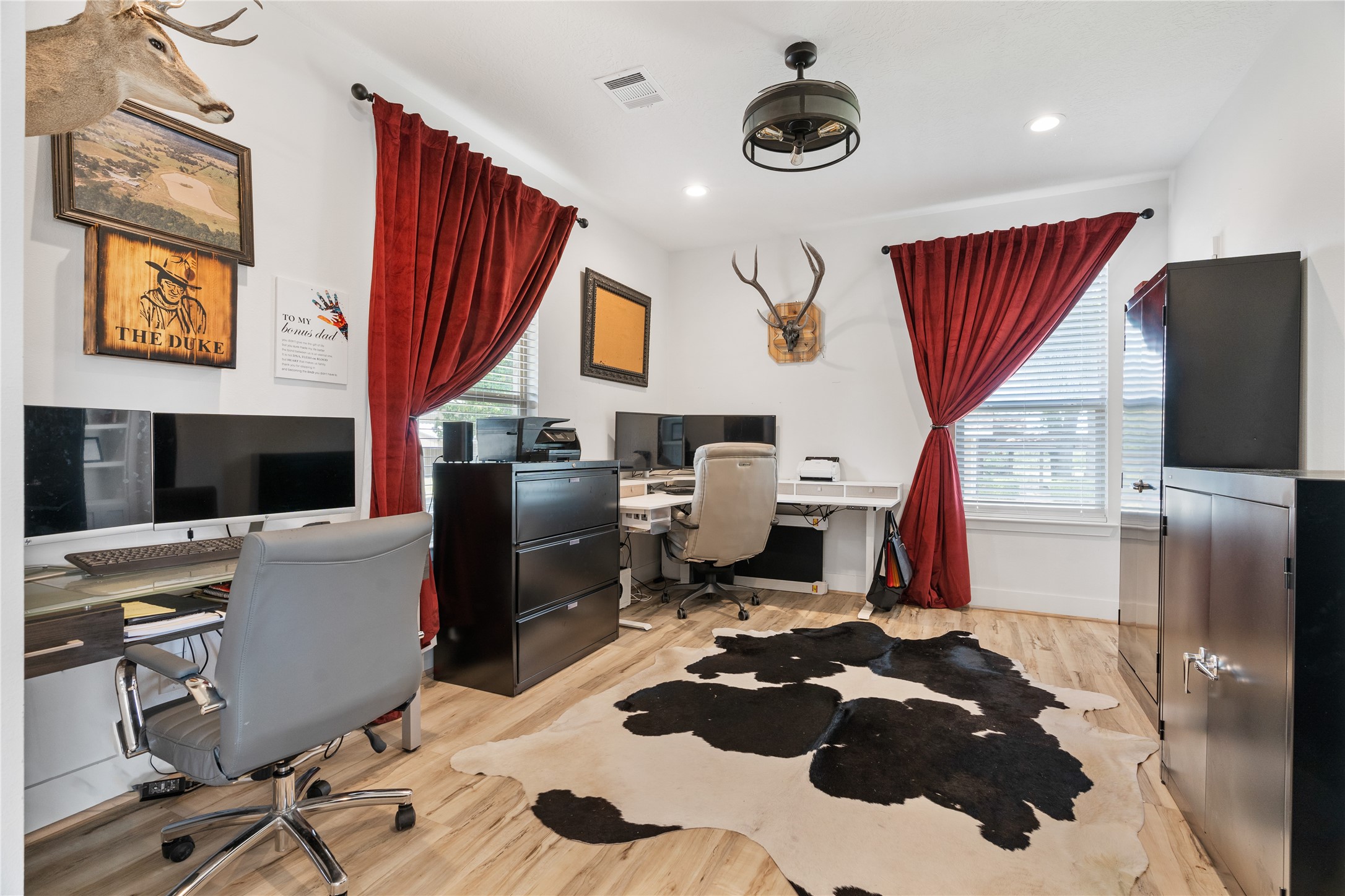 41111 Community Road Magnolia, TX 77354 - Photo 20 of 49 a room with furniture a rug and a window