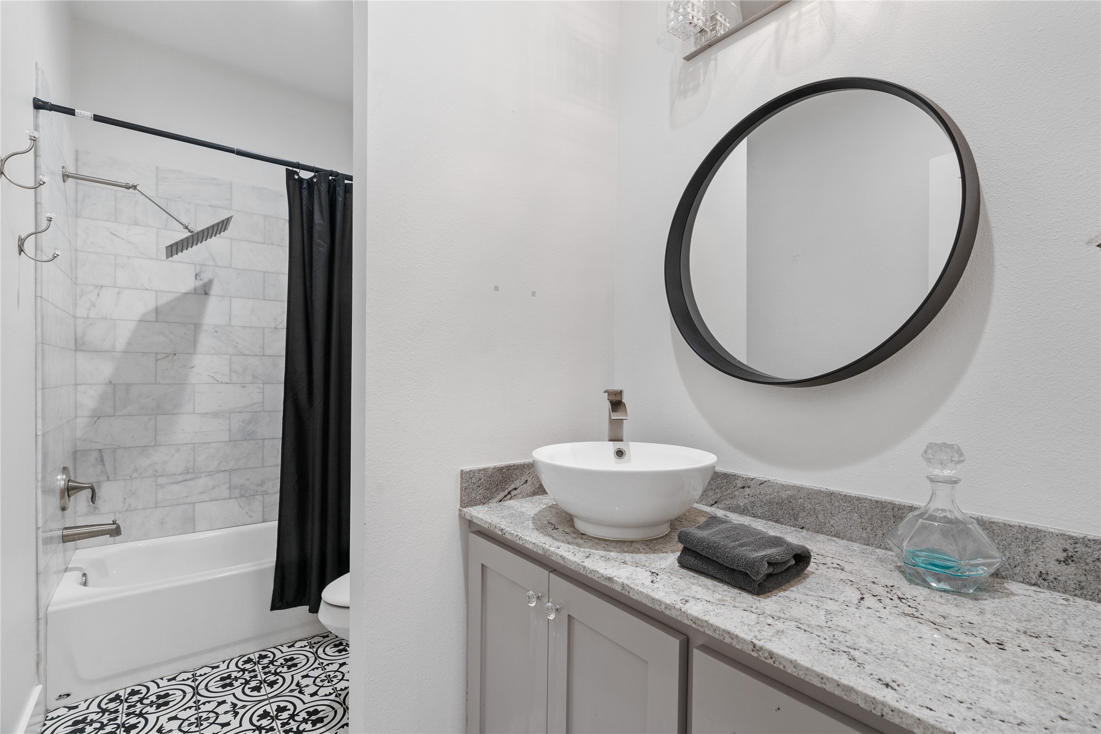 41111 Community Road Magnolia, TX 77354 - Photo 22 of 49 a bathroom with a sink a toilet and a mirror