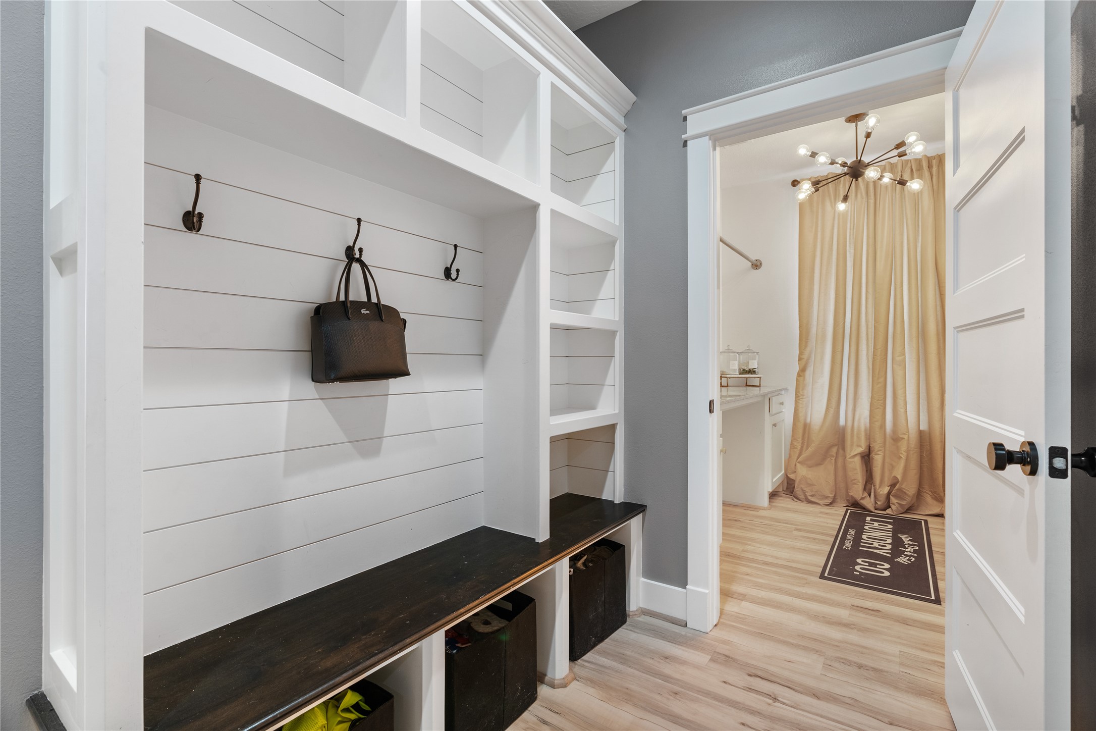 41111 Community Road Magnolia, TX 77354 - Photo 23 of 49 a view of a walk in closet and wooden floor