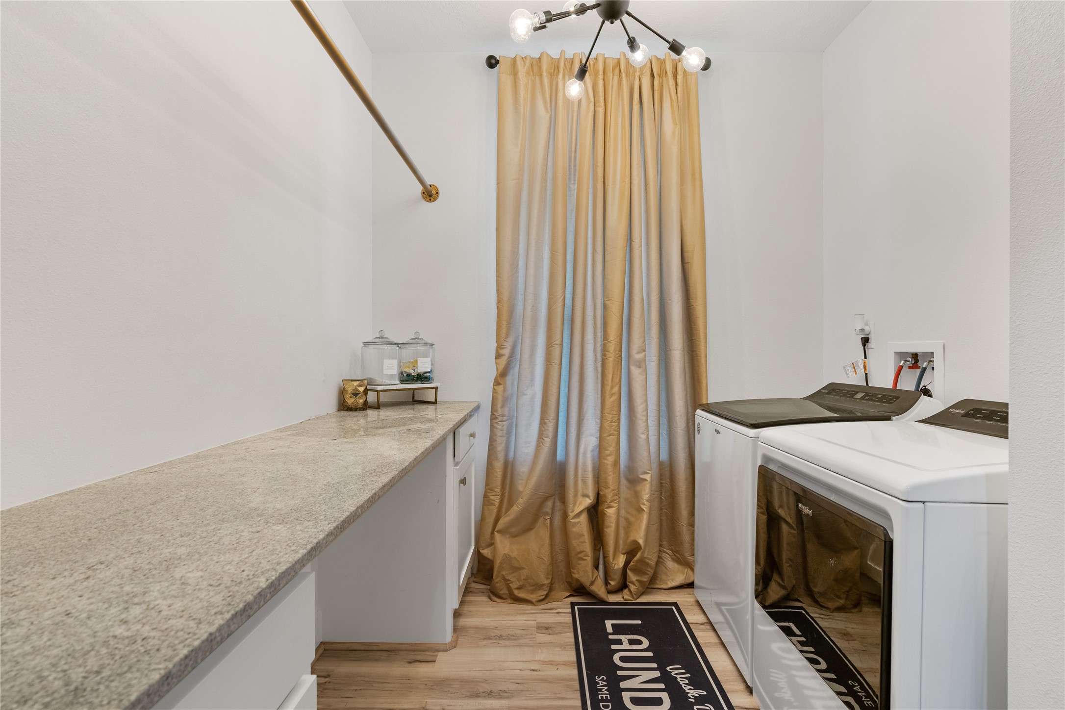 41111 Community Road Magnolia, TX 77354 - Photo 24 of 49 a utility room with dryer and washer
