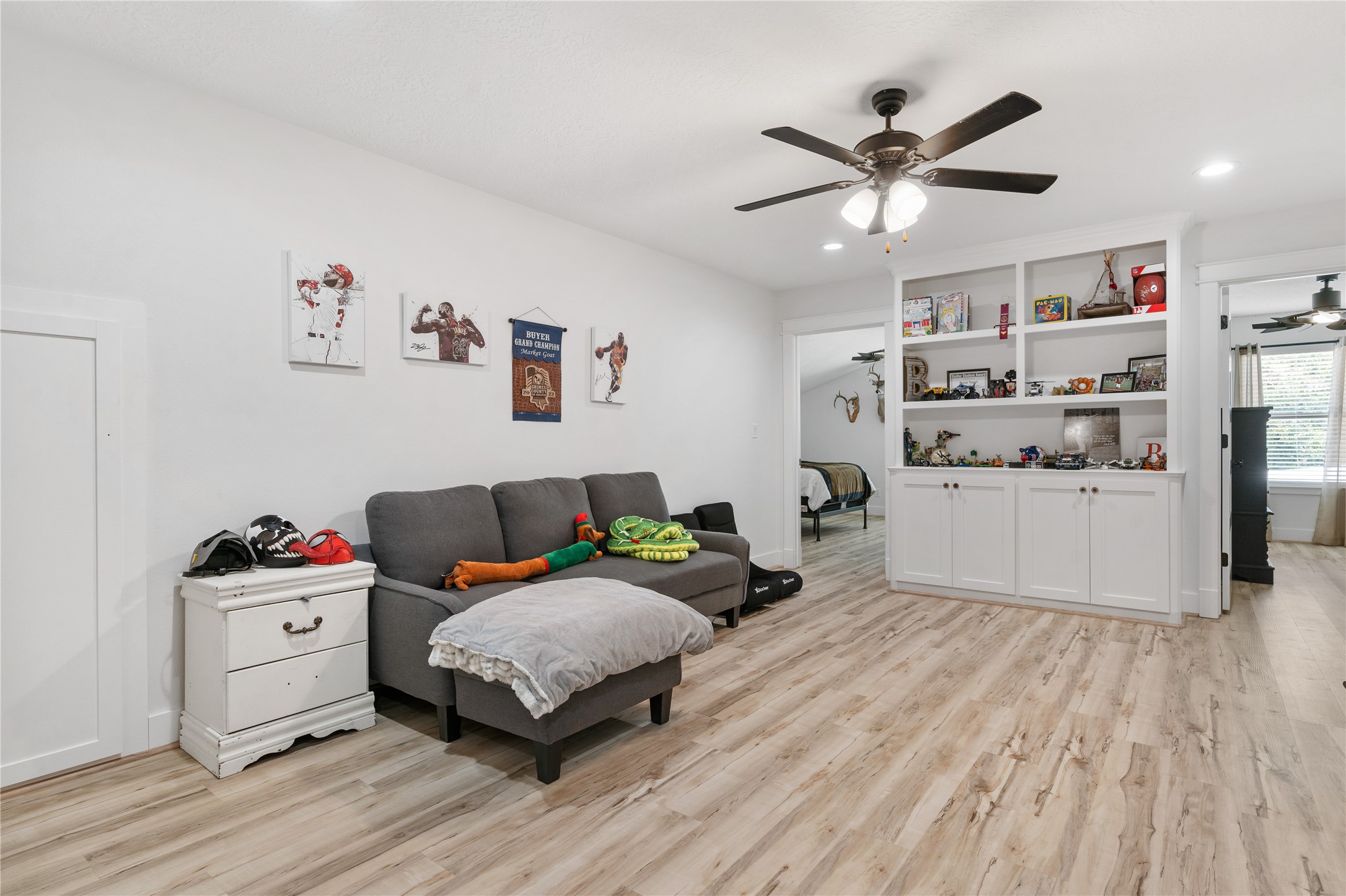 41111 Community Road Magnolia, TX 77354 - Photo 26 of 49 a living room with furniture and kitchen view