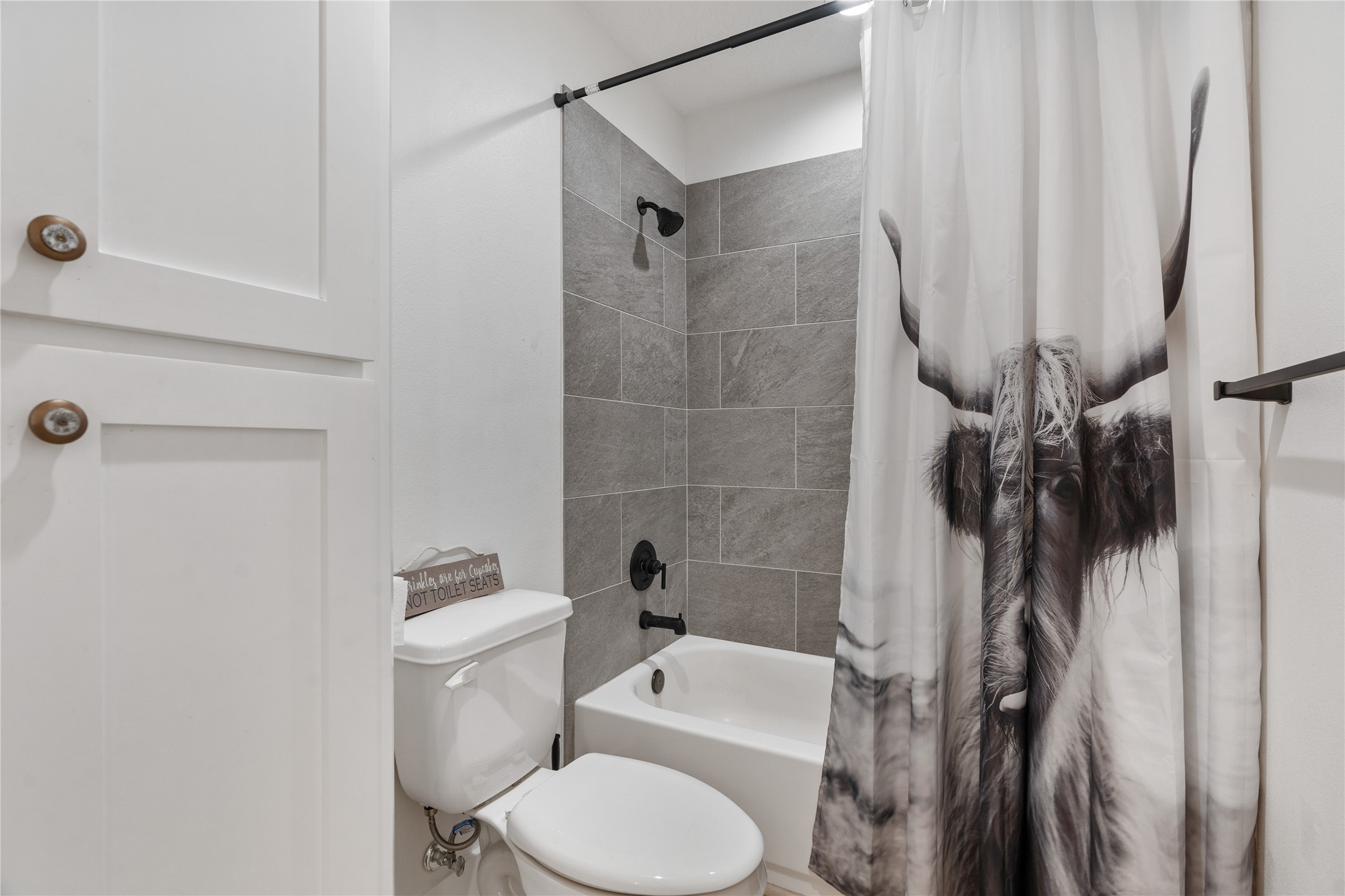 41111 Community Road Magnolia, TX 77354 - Photo 30 of 49 a bathroom with a toilet and a shower