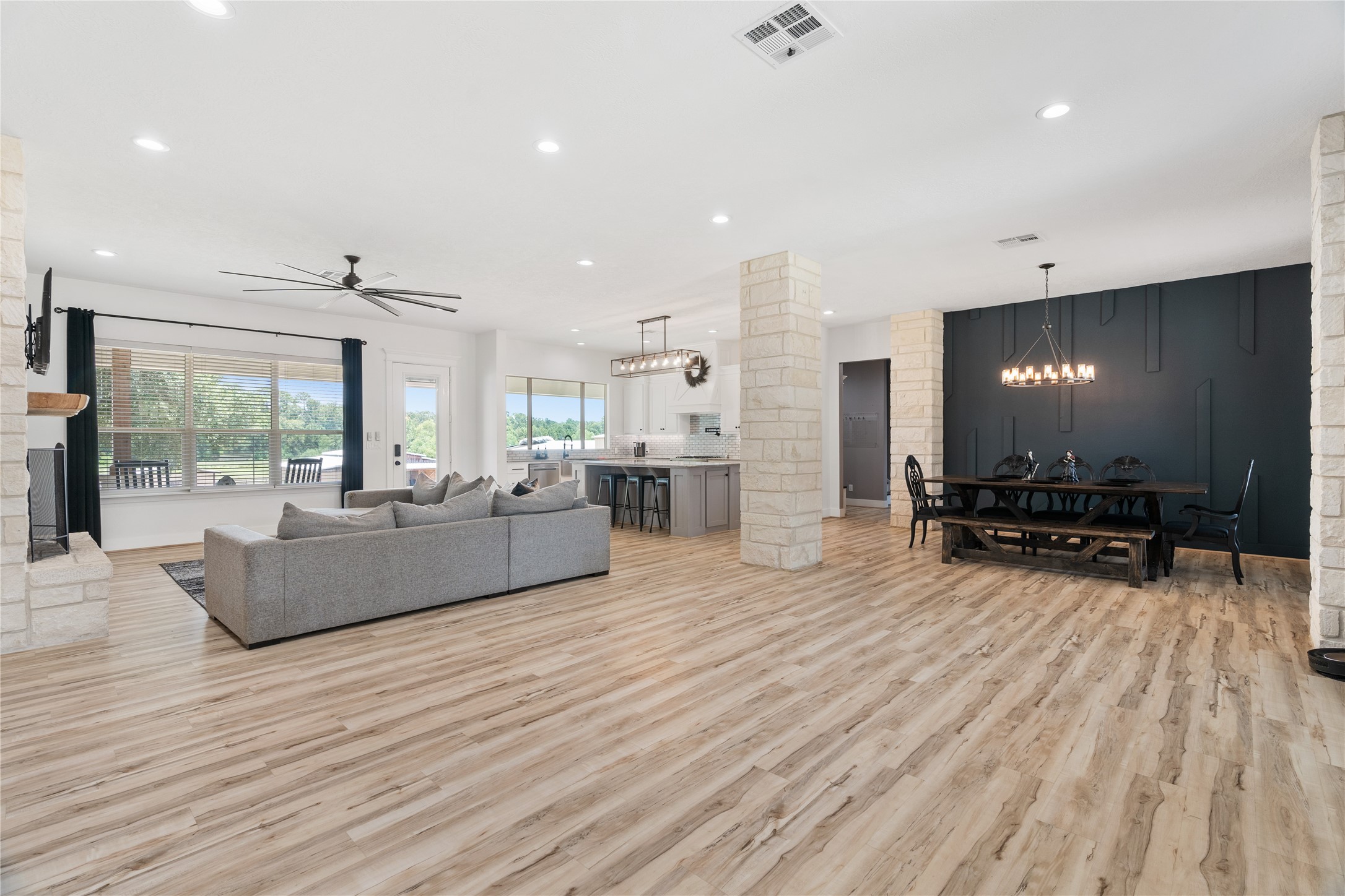 41111 Community Road Magnolia, TX 77354 - Photo 5 of 49 a living room with furniture and a flat screen tv