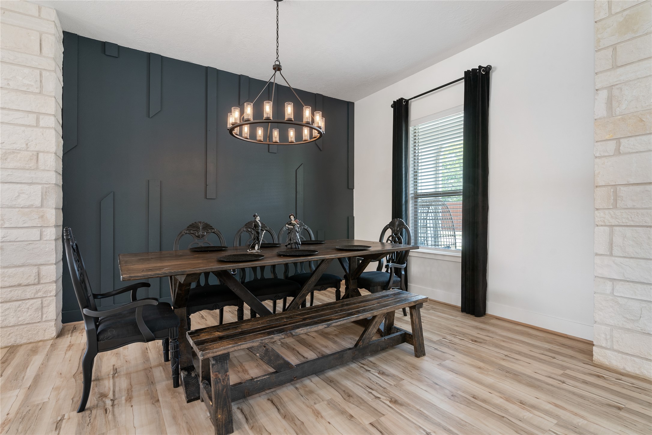 41111 Community Road Magnolia, TX 77354 - Photo 9 of 49 a view of a dining room with furniture window and wooden floor