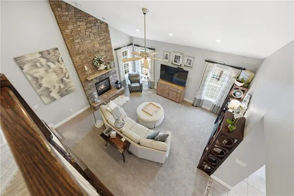 a view of living room with furniture and flat screen tv