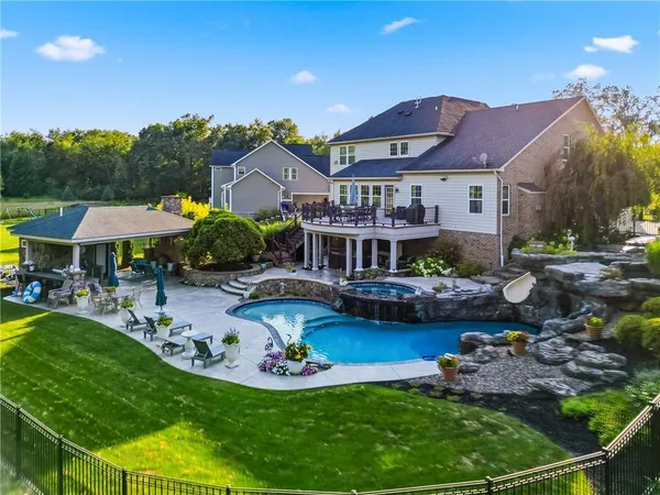 a swimming pool and outdoor seating