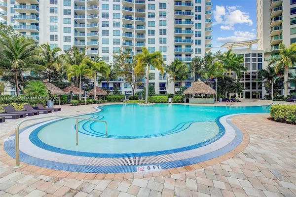 a view of swimming pool from a outdoor space