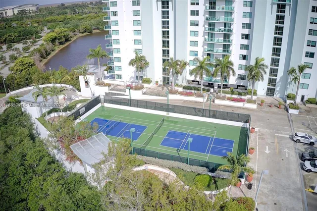 a view of swimming pool with outdoor seating