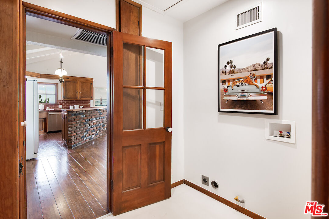 27280 Eastvale Road Palos Verdes Peninsula, CA 90274 - Photo 14 of 34 a view of a hallway with workspace