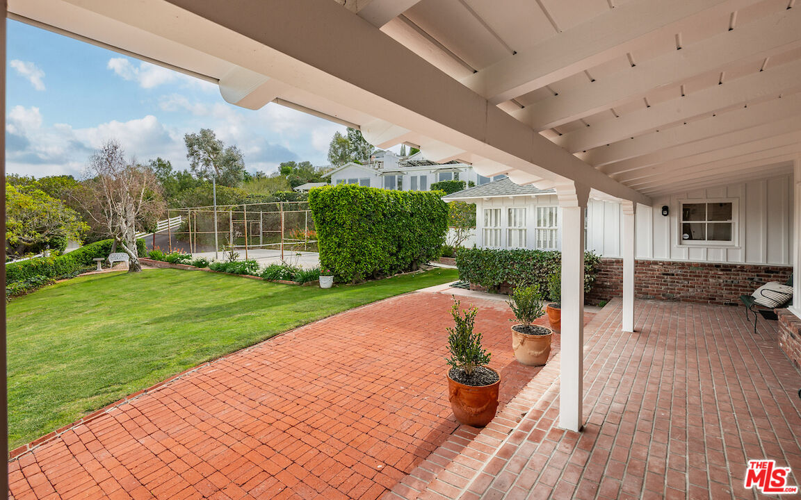 27280 Eastvale Road Palos Verdes Peninsula, CA 90274 - Photo 25 of 34 a view of a house with backyard and porch