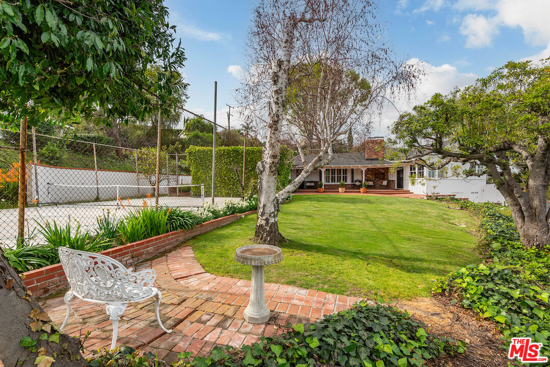 27280 Eastvale Road Palos Verdes Peninsula, CA 90274 - Photo 32 of 34 a view of a house with a yard