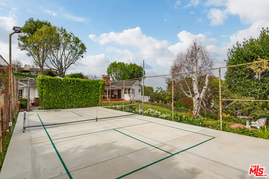 27280 Eastvale Road Palos Verdes Peninsula, CA 90274 - Photo 5 of 34 a view of a pathway with a wrought fence