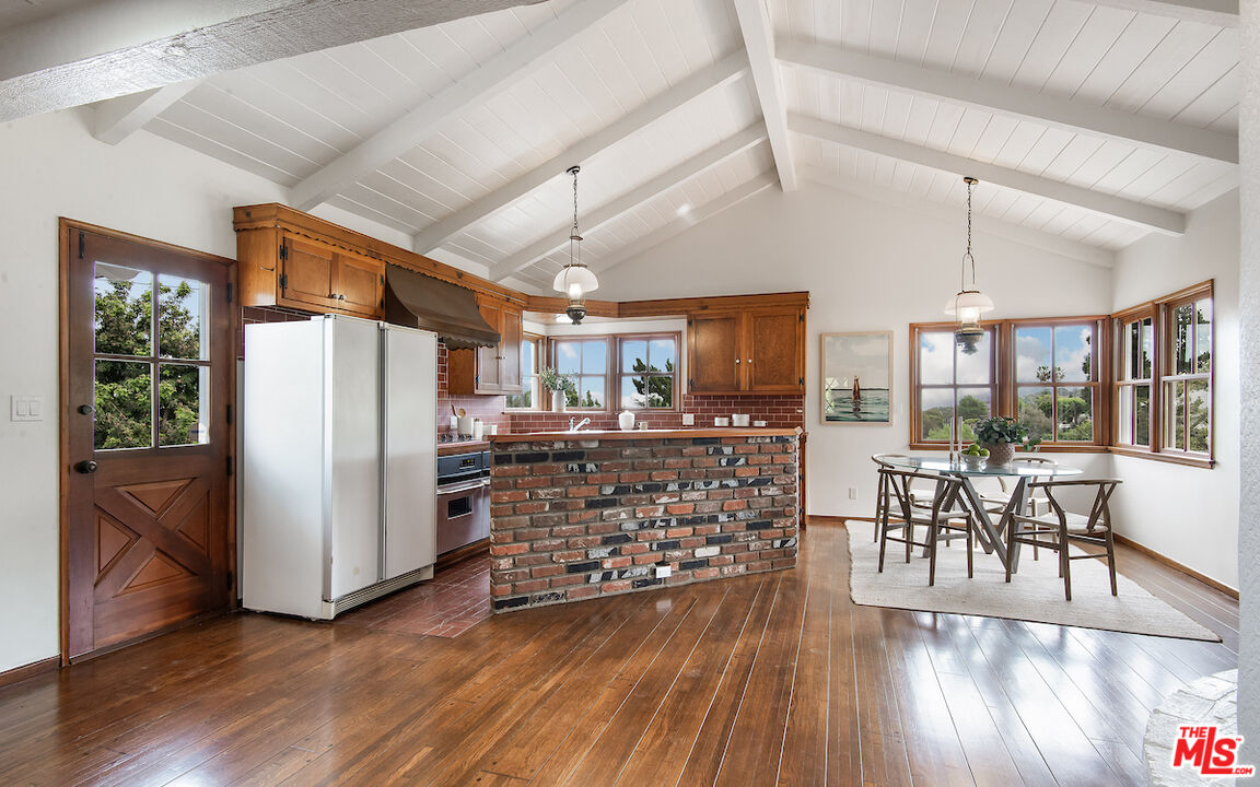 27280 Eastvale Road Palos Verdes Peninsula, CA 90274 - Photo 10 of 34 a view of a dining room with furniture window and wooden floor