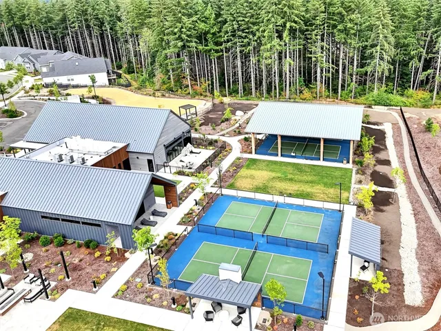 a picture of a living room with a fireplace