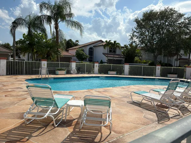 a view of a chairs and table on the terrace