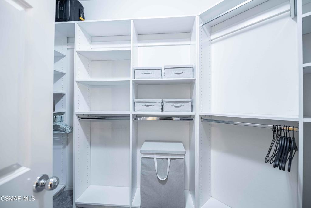 580 Fenwick Way, Unit C Simi Valley, CA 93065 - Photo 26 of 39 a view of walk in closet with empty racks