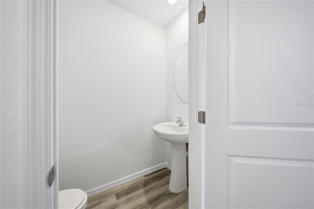 2480 Riversong Ldg Lane Wesley Chapel, FL 33543 - Photo 11 of 30 a bathroom with a sink