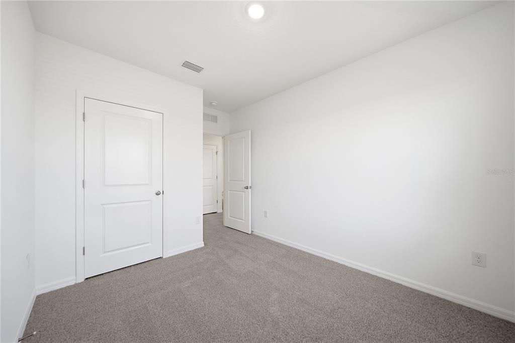 2480 Riversong Ldg Lane Wesley Chapel, FL 33543 - Photo 20 of 30 a view of an empty room