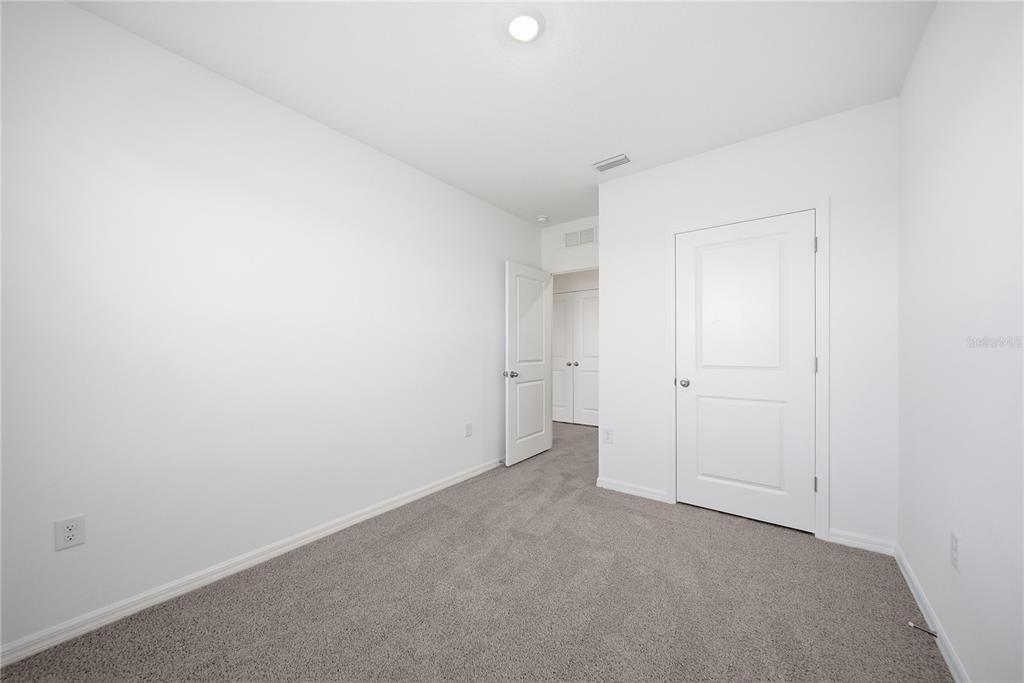 2480 Riversong Ldg Lane Wesley Chapel, FL 33543 - Photo 22 of 30 a view of an empty room