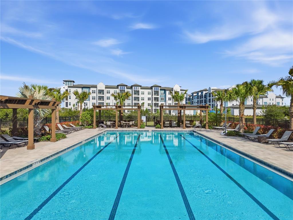 2480 Riversong Ldg Lane Wesley Chapel, FL 33543 - Photo 27 of 30 a view of swimming pool from a balcony