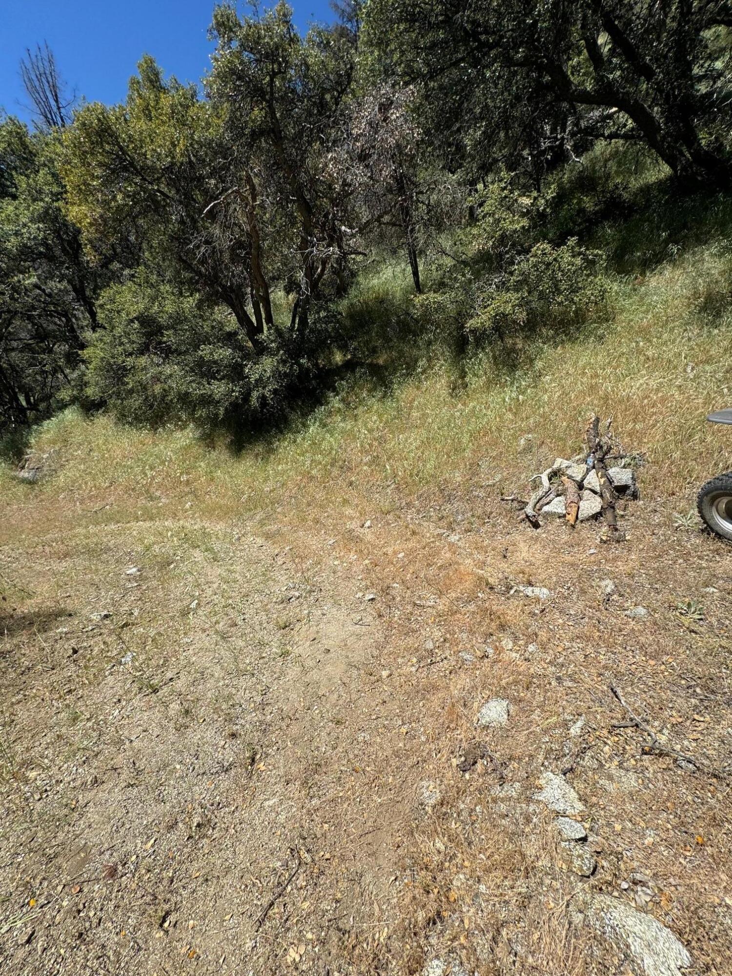 Tehachapi Mountains Tehachapi, CA 93561 - Photo 15 of 16 a view of a lake with a mountain