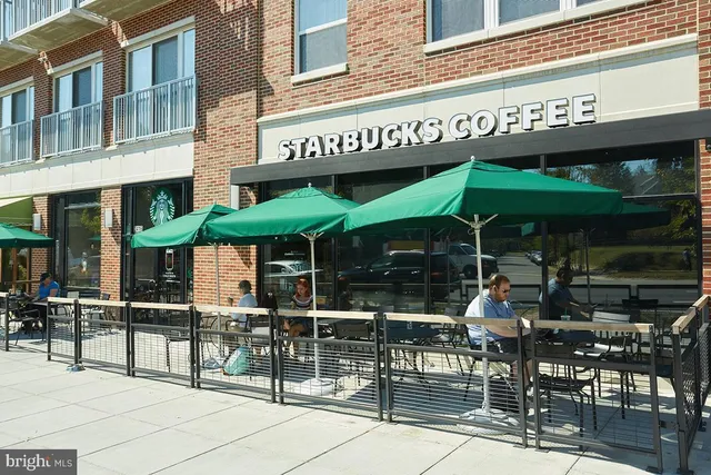 a view of cafe with outdoor sitting area