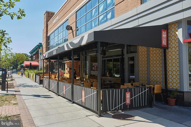 a view of street with shops