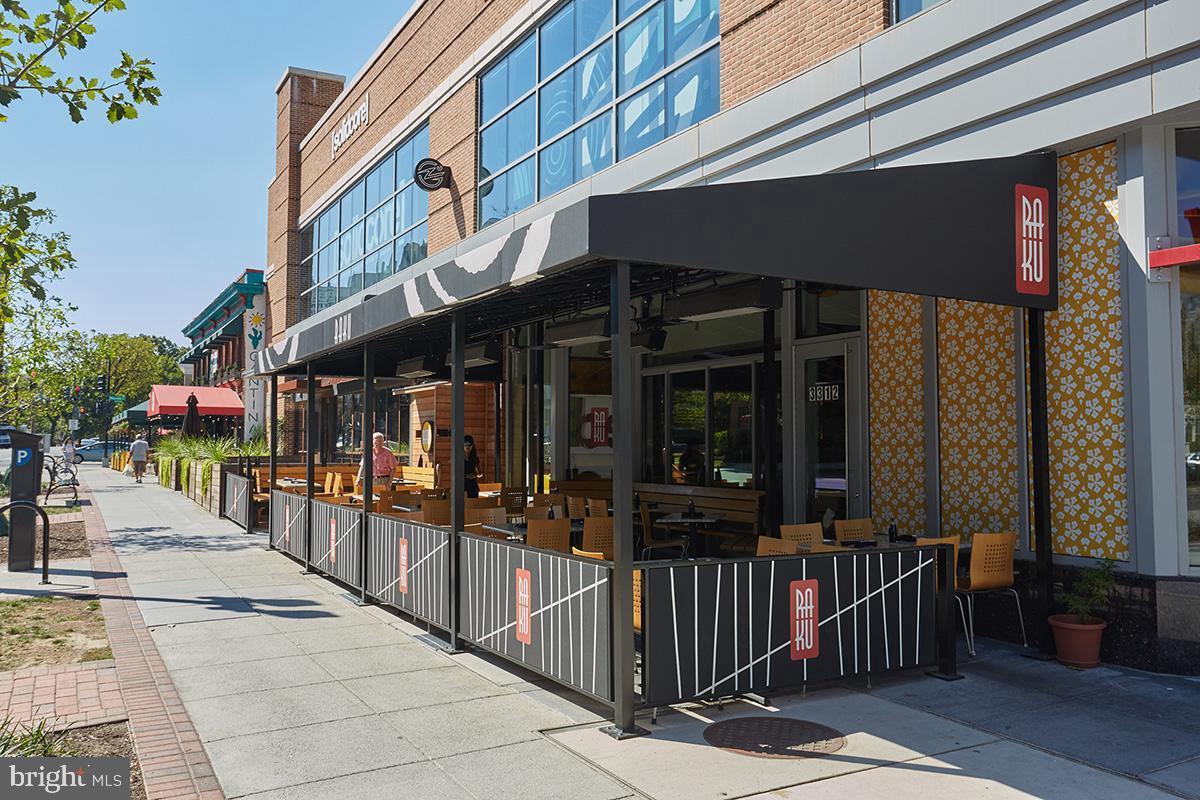 3880 Rodman Street Northwest, Unit C213 Washington, DC 20016 - Photo 21 of 32 a view of street with shops