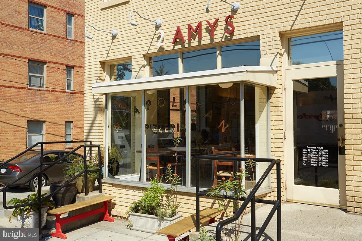 3880 Rodman Street Northwest, Unit C213 Washington, DC 20016 - Photo 23 of 32 a view of a cafe with outdoor seating
