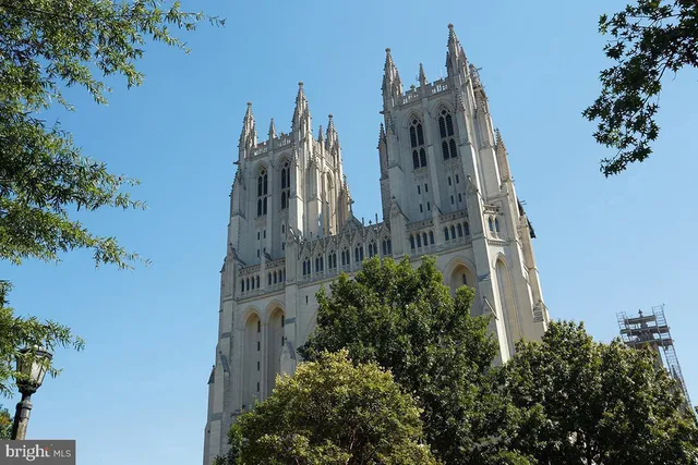 a view of a building with retail shops