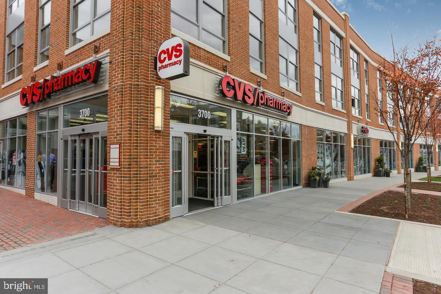 3880 Rodman Street Northwest, Unit C213 Washington, DC 20016 - Photo 27 of 32 a view of a building with retail shops