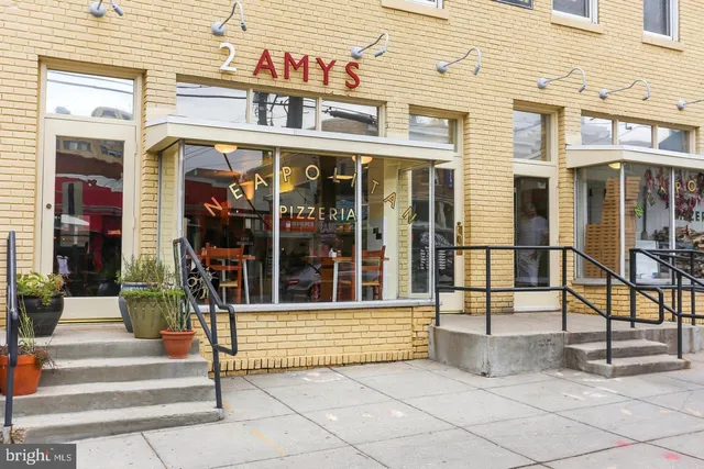 a view of street with sitting area