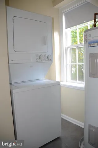 a view of washer and dryer with a glass door