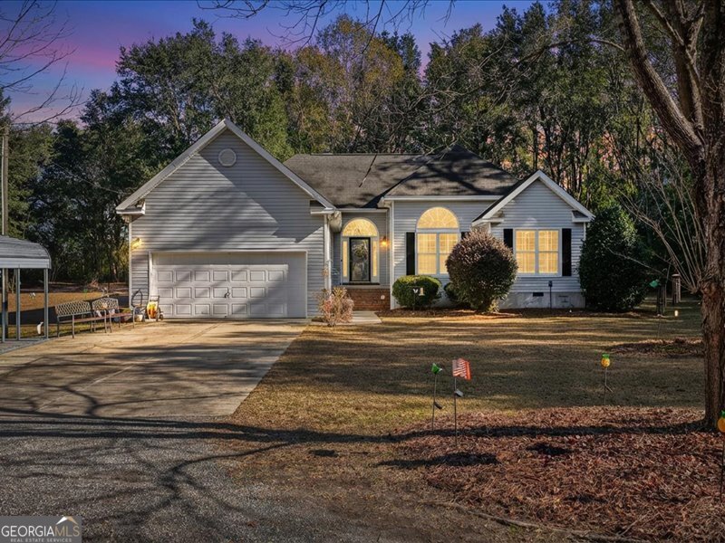 1508 Liberty Expressway Albany, GA 31705 - Photo 1 of 55 a front view of a house with a yard