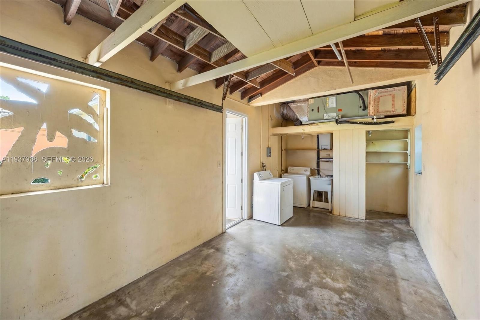 9148 Abbott Avenue Surfside, FL 33154 - Photo 31 of 39 a view of a storage & utility room