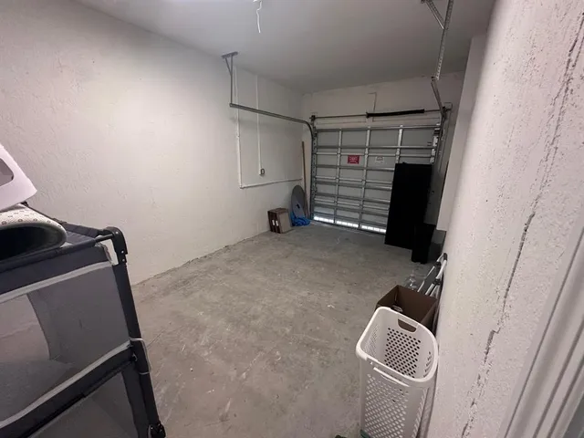 a view of room with stairs and a couch