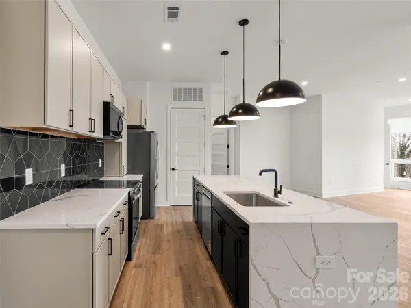 $1,349,990 | 123 Haywood Street, Unit 203, Asheville, NC 28801