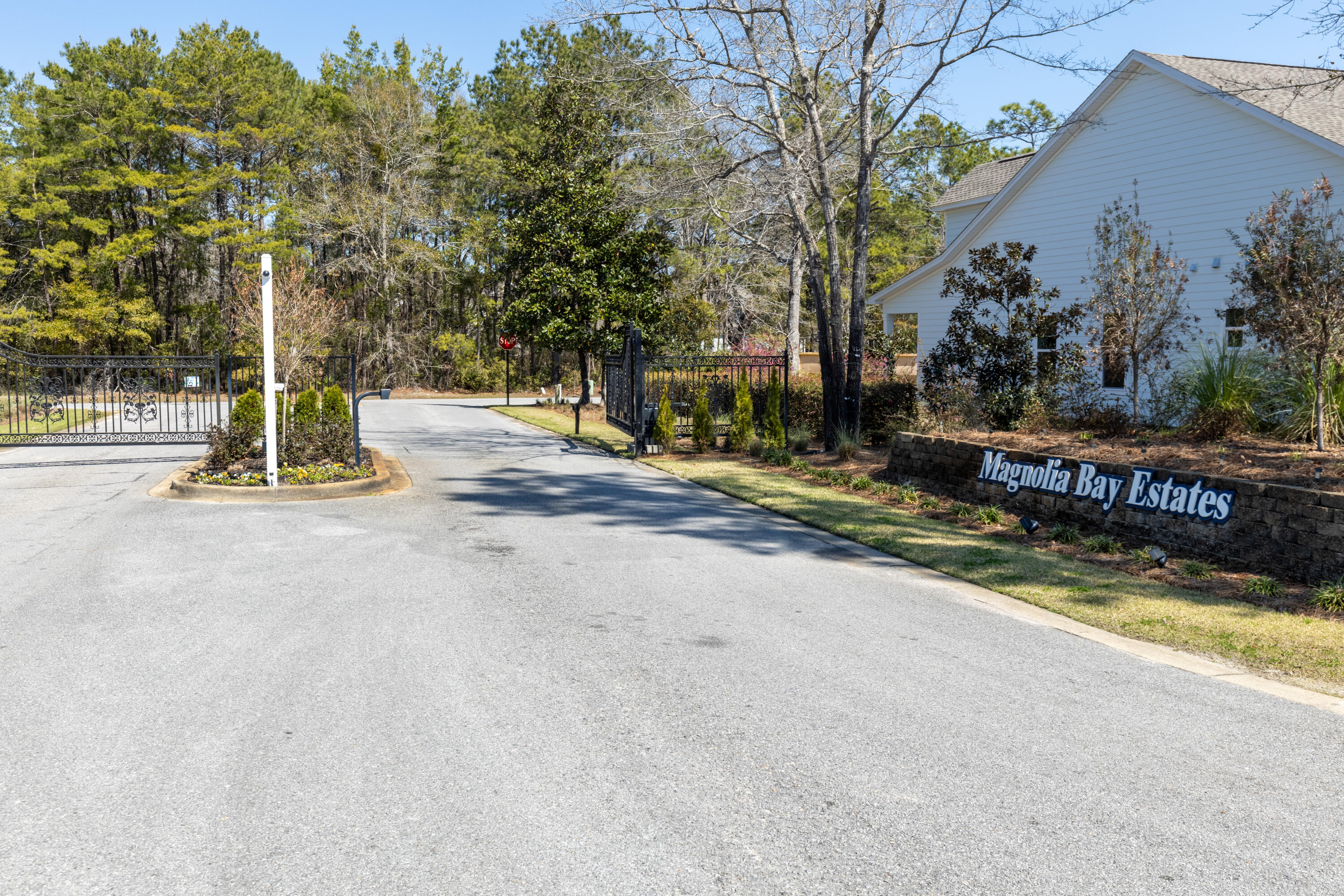 Lot 27 Hunter Way Freeport, FL 32439 - Photo 2 of 13 a view of street with large trees