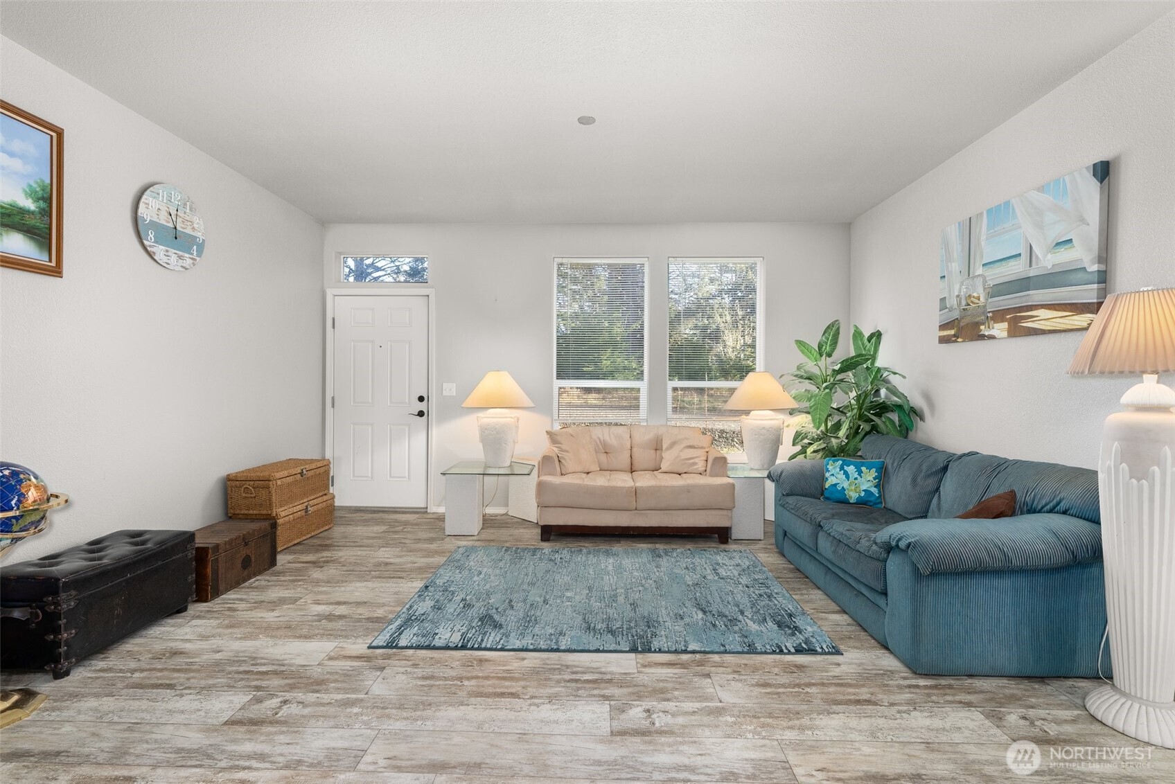 4 Lakeview Lane South Bend, WA 98586 - Photo 17 of 40 a living room with furniture and a large window