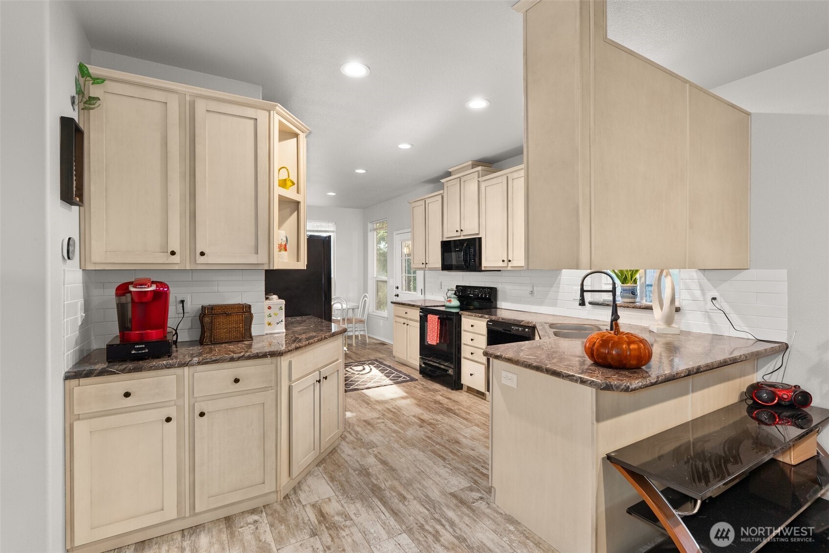 4 Lakeview Lane South Bend, WA 98586 - Photo 19 of 40 a kitchen with white cabinets and appliances