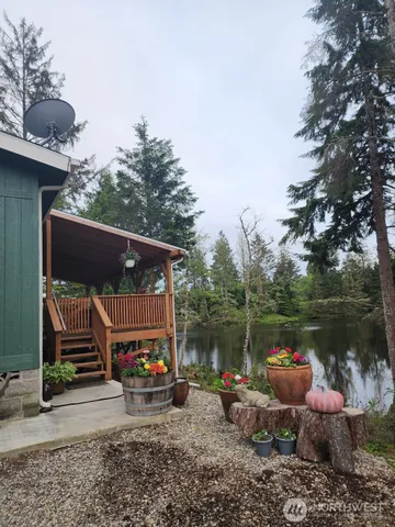 a view of a chair and table in the patio