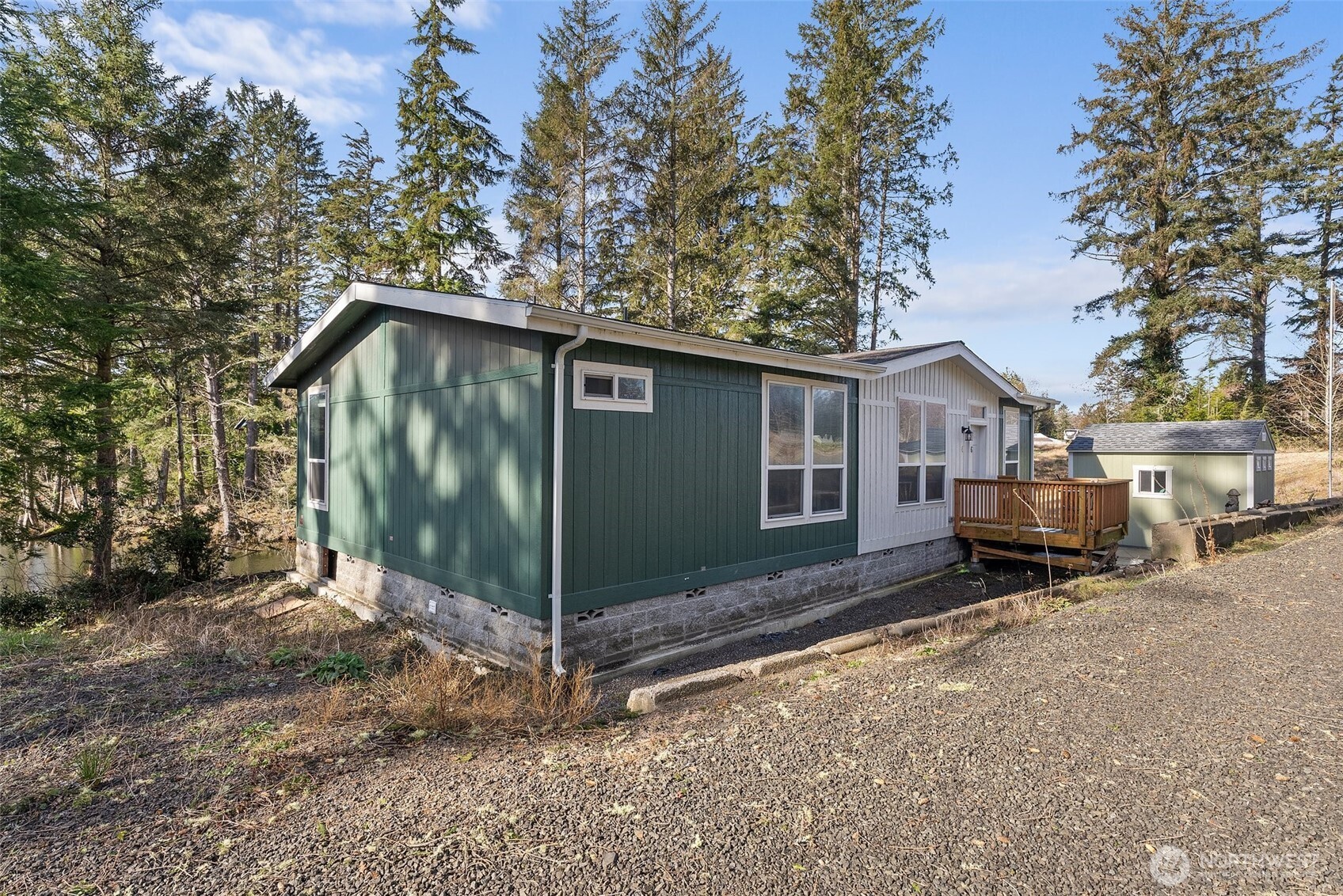 4 Lakeview Lane South Bend, WA 98586 - Photo 32 of 40 a view of a house with a yard
