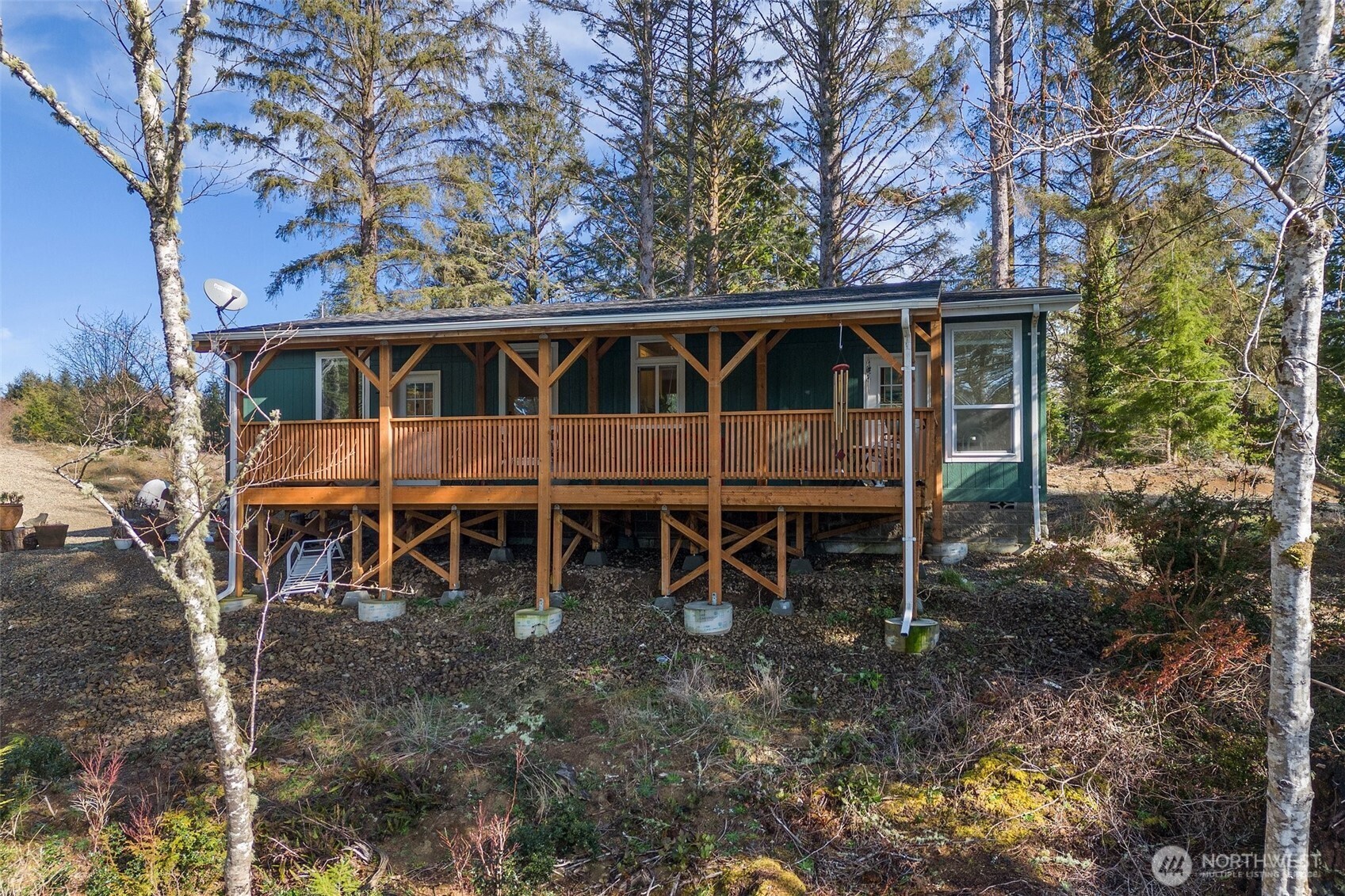 4 Lakeview Lane South Bend, WA 98586 - Photo 5 of 40 a view of a chairs and table in the backyard
