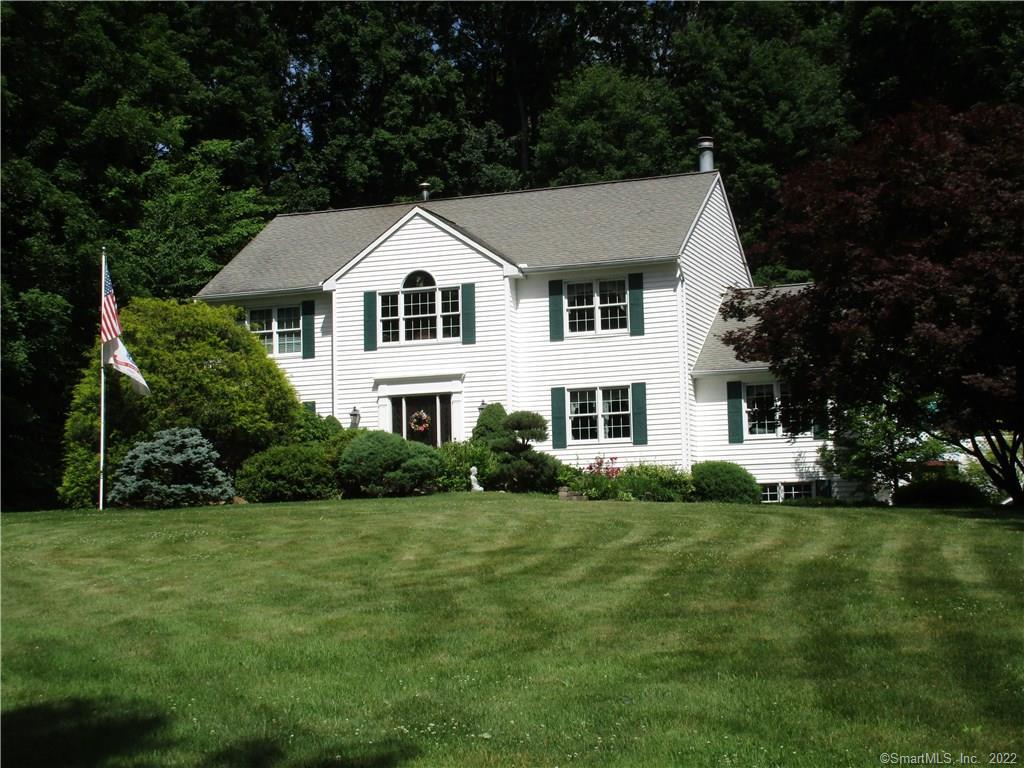 22 Weed Road Bethel, CT 06801 - Photo 1 of 1 a front view of a house with a yard