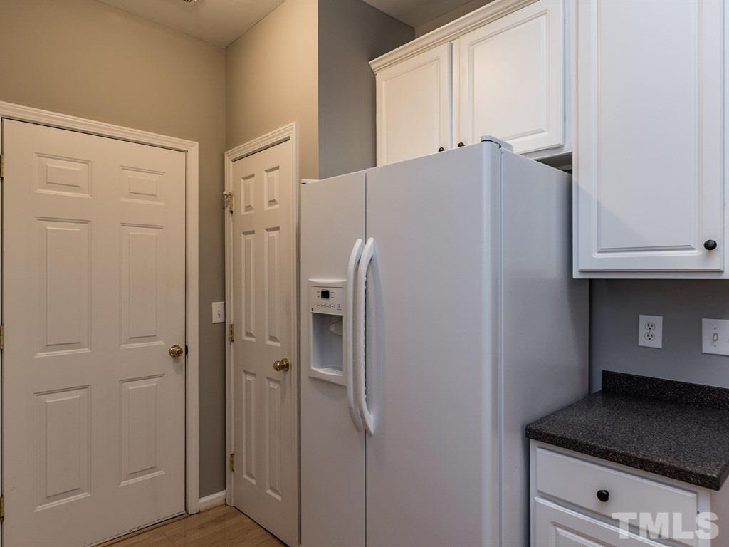 10483 Dapping Drive Raleigh, NC 27614 - Photo 3 of 21 a close view of a refrigerator in kitchen