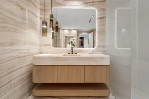 a bathroom with a bathtub and a sink