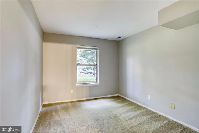 an empty room with a window