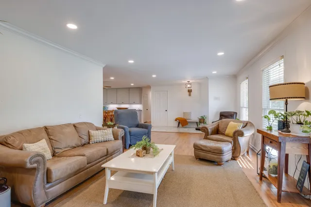 a living room with furniture and a couch